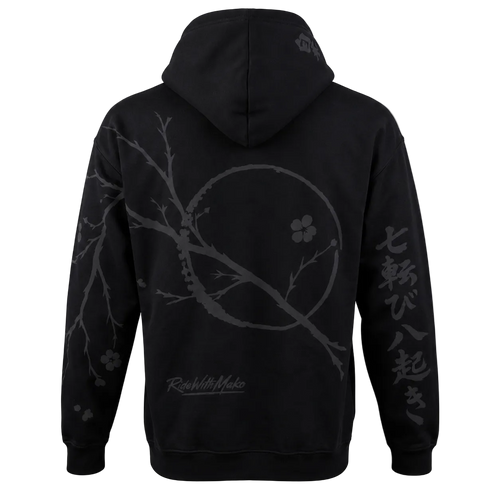 Black pullover hoodie shown from the back, featuring a dark gray cherry blossom branch and circle graphic, Japanese characters on the right sleeve, and a small 'Rough With Pride' logo near the lower back, set against a plain white background.